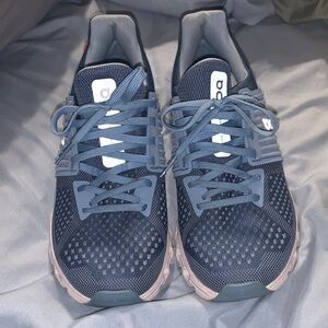On Running Athletic Shoes in Blue and Gray